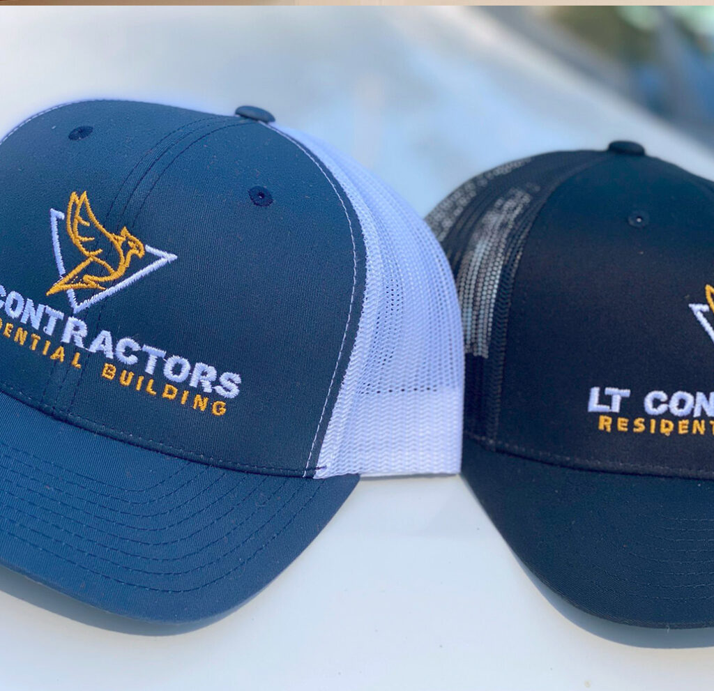 View of a Engineer and worker watching blueprint on construction site